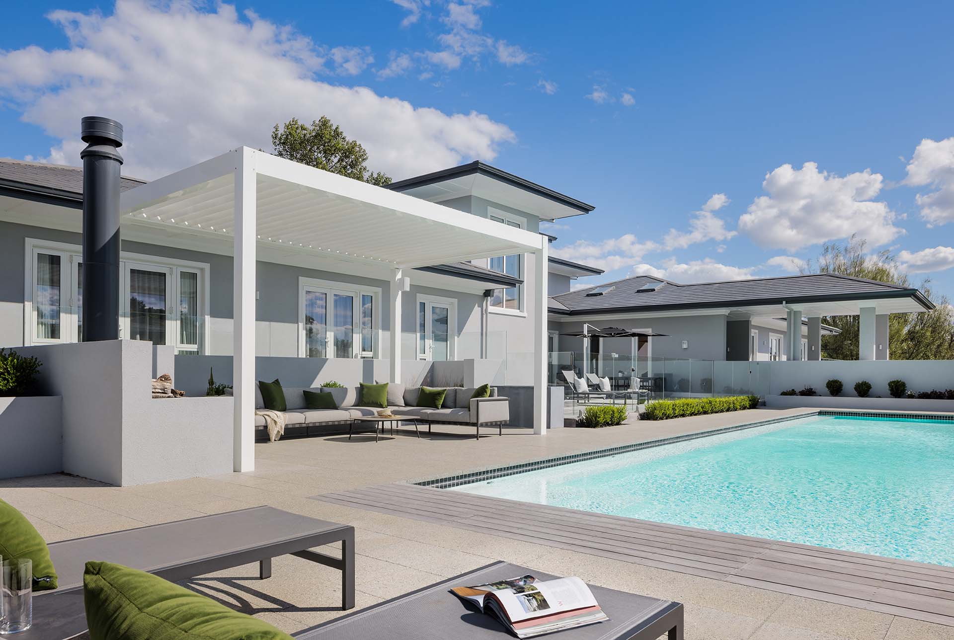 Pool side Architectural photograph of Modern Eco home by Aaron Radford